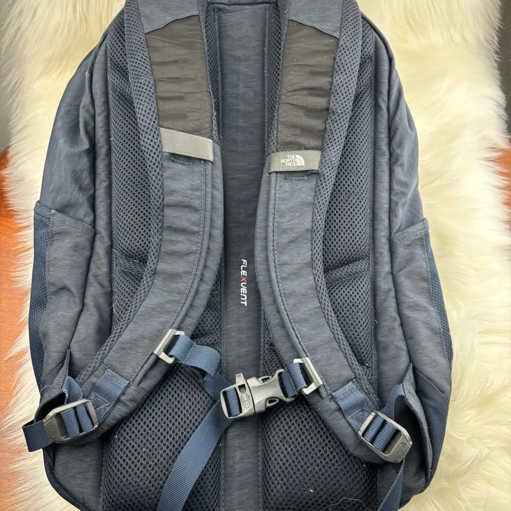 The North Face Blue Backpack with Durable Design and Versatile Functionality